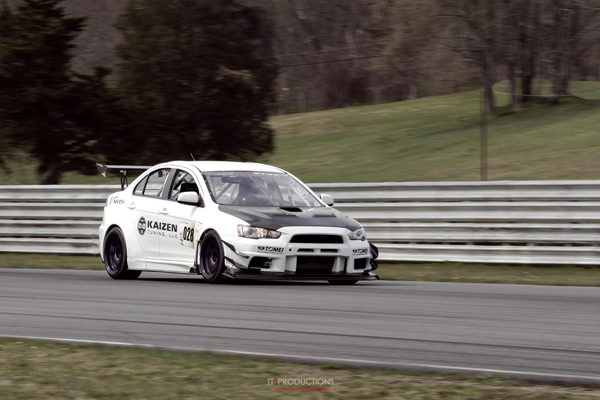 The pictured car is the Kaizen / Varis Time attack Evo X. 